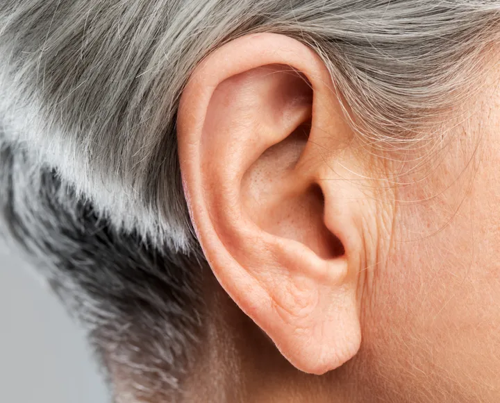Close-up of an older person's ear